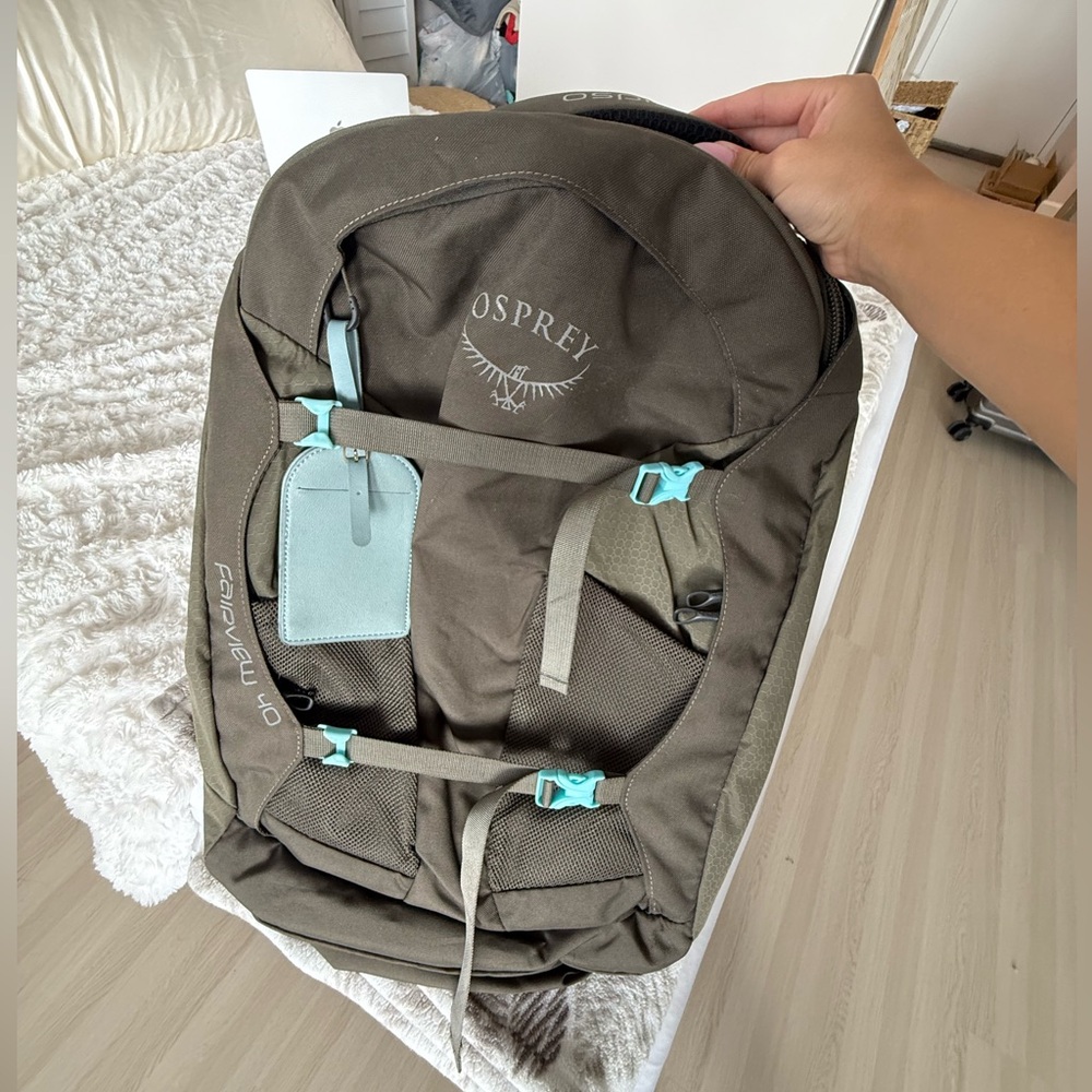 Osprey teal travelers backpack. 45L